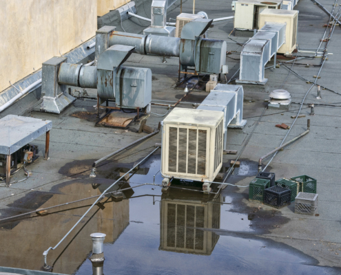 Commercial Roof with water ponding and leaking roof